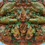 pawal curry served on a plate with cilantro garlish