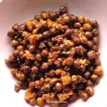 sauteed chickpeas in a pink bowl closeup pic