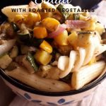 cold pasta salad with roasted veggies in a bowl